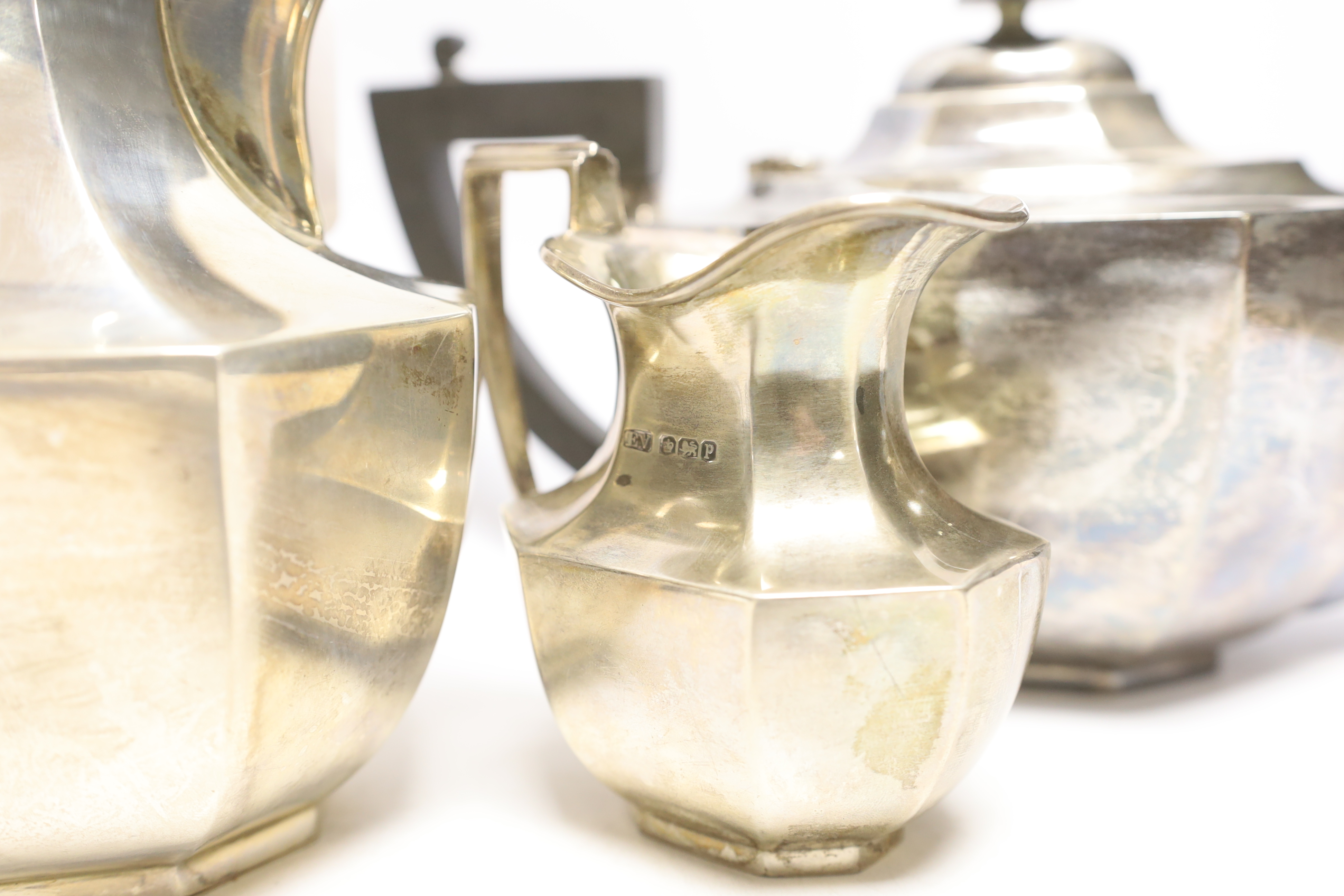 A 1930's silver four piece tea set with ebonised handles, Viners Ltd, Sheffield, 1932